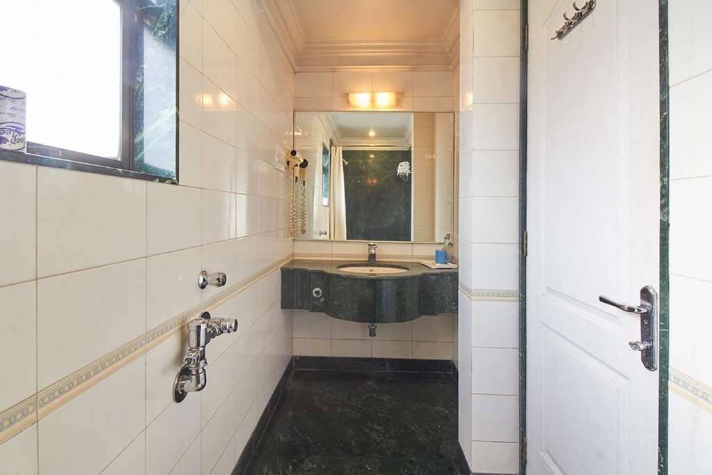 Hotel Srimaan Pune Oda fotoğraf